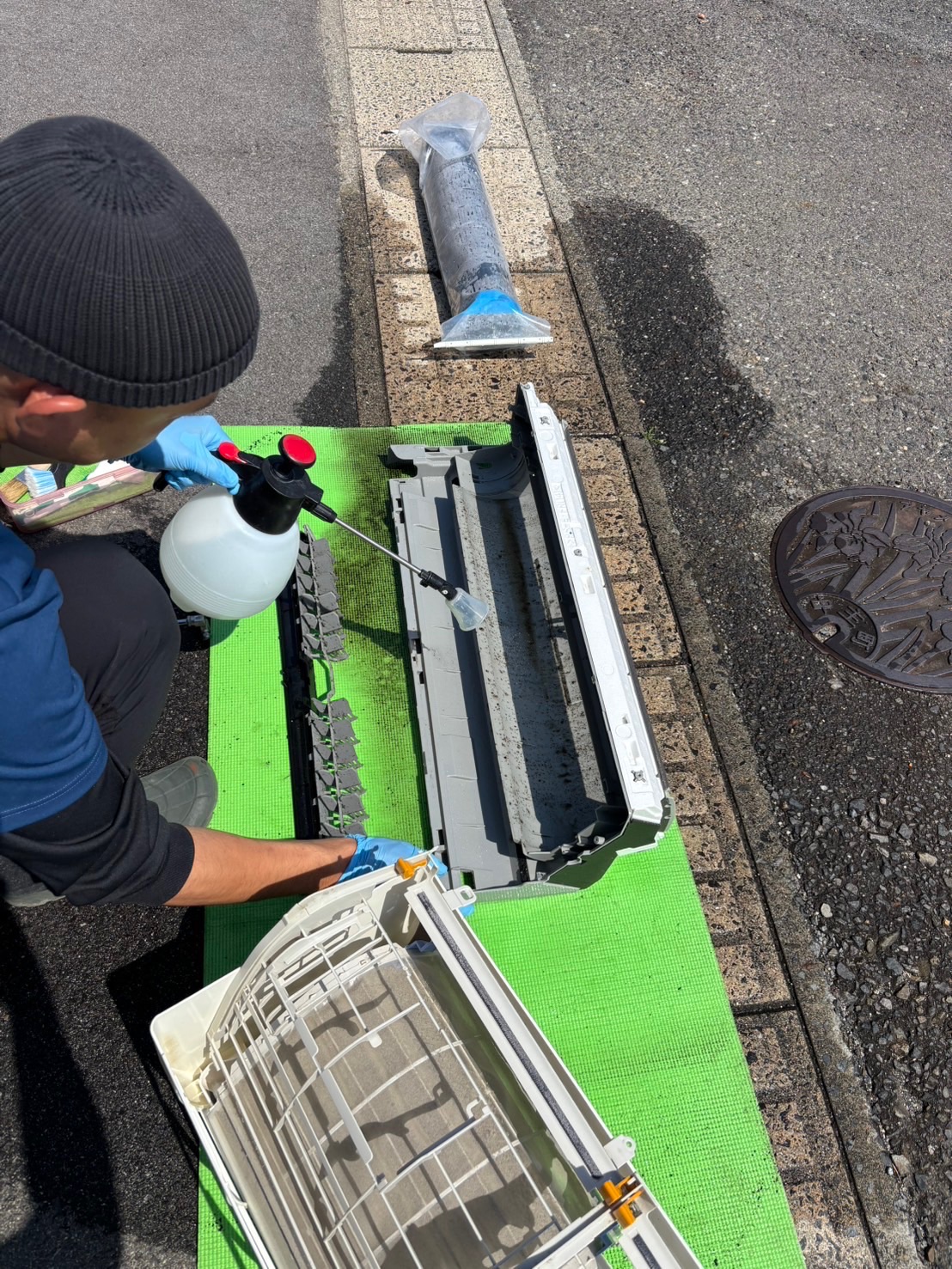 パーツを屋外で洗浄